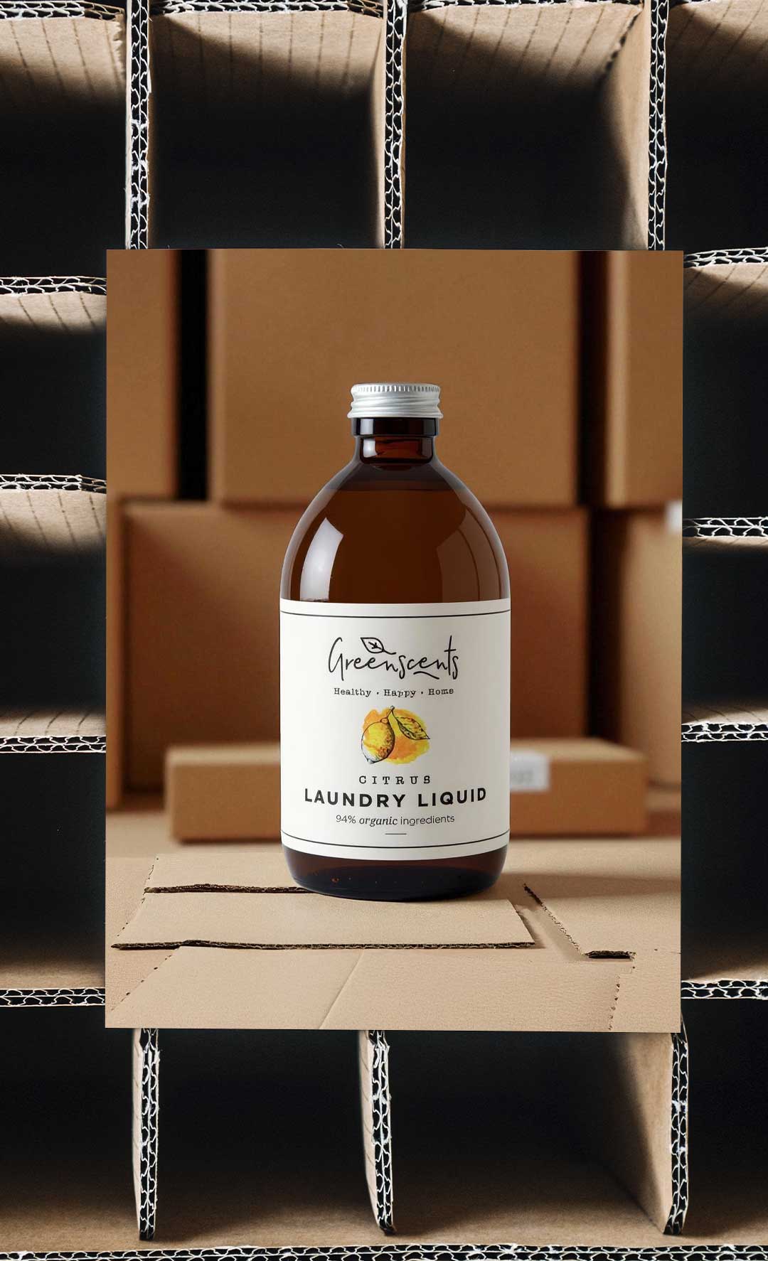 Bottle of greenscents laundry liquid on a cardboard box 